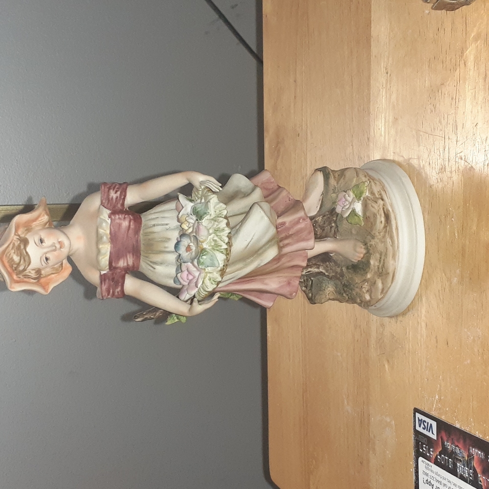 Andrea by Sadek girl with basket.